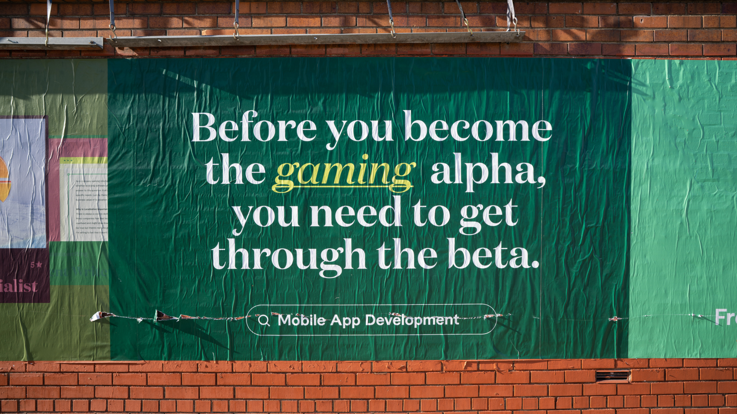 Hand-painted curved brick wall: Before you run the web you need someone to crawl it—lime side panel, maroon field, SEO callout, street lamps above