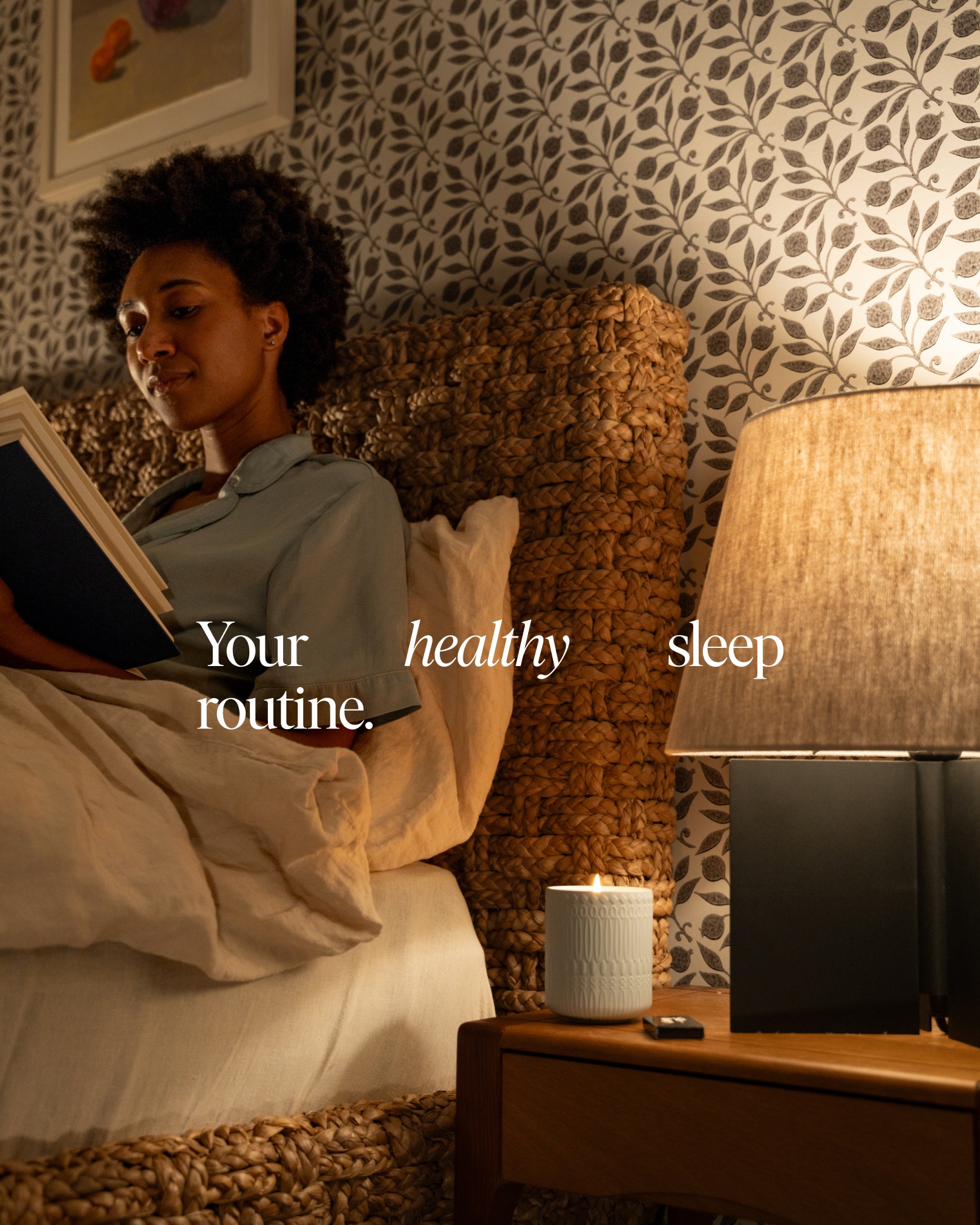 Siblings lifestyle: woman reading in bed with lit candle on nightstand, 'Your healthy sleep routine' typography overlay